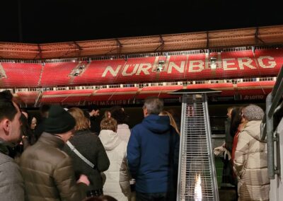 Tribüne im Max-Morlock-Stadion mit Vereinslogo des 1. FC Nürnberg